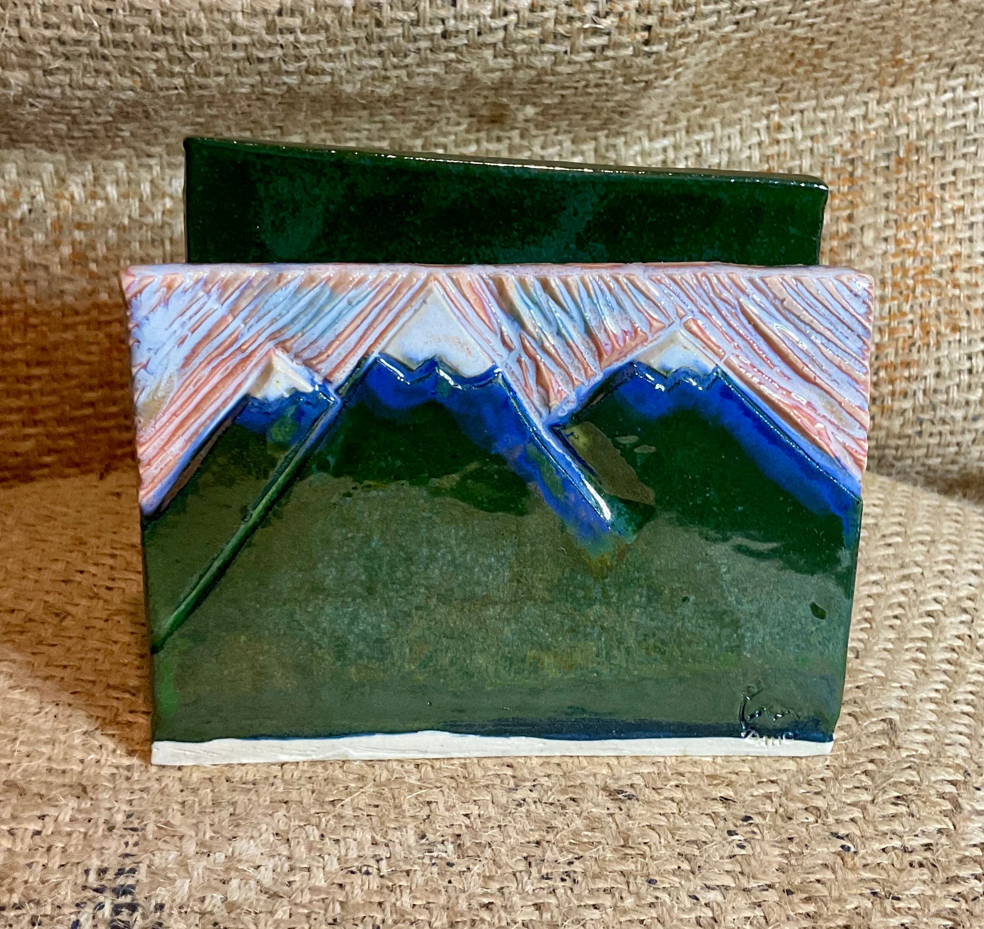 Pottery- carved mountains napkin holder