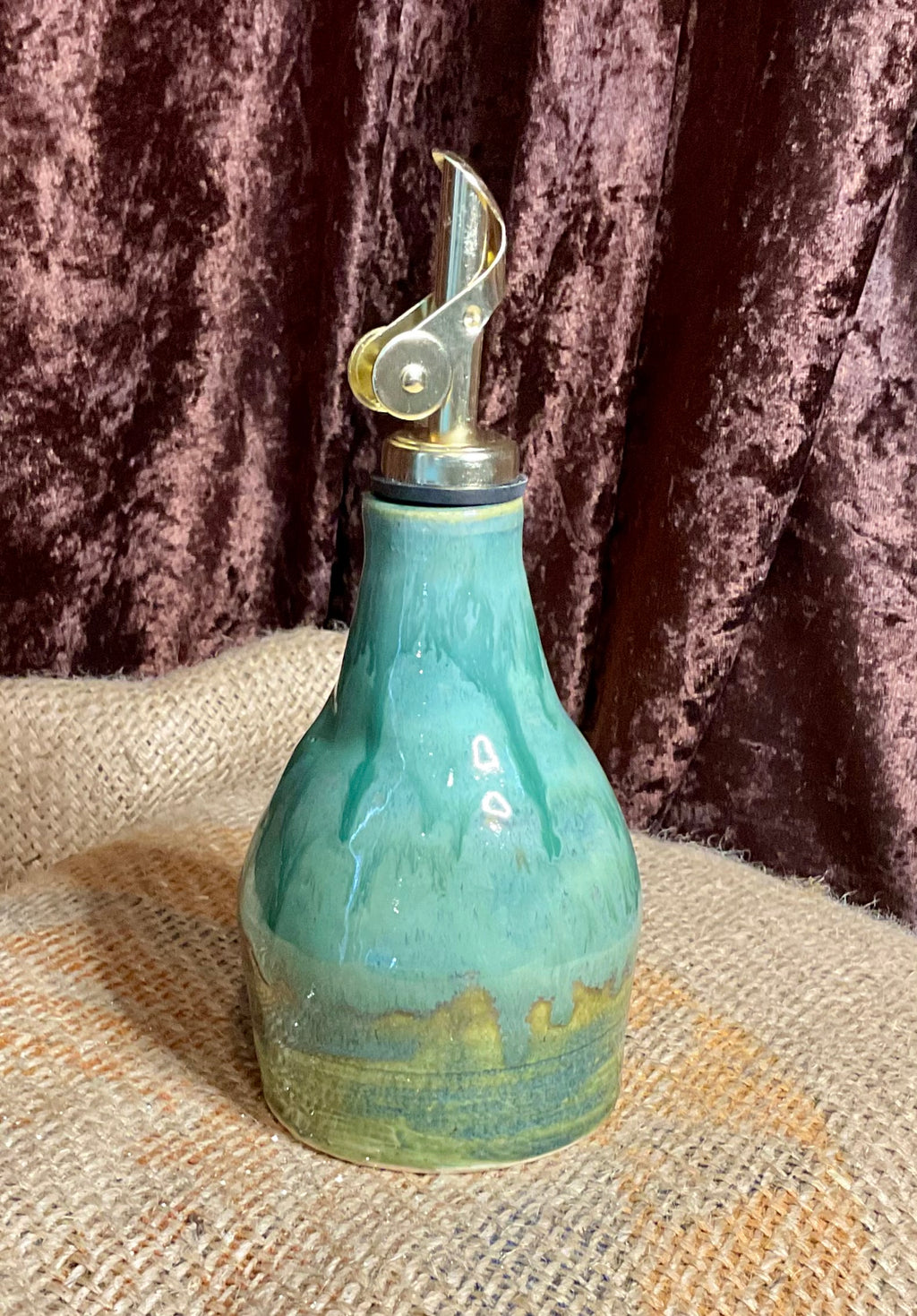 Pottery- green oil bottle