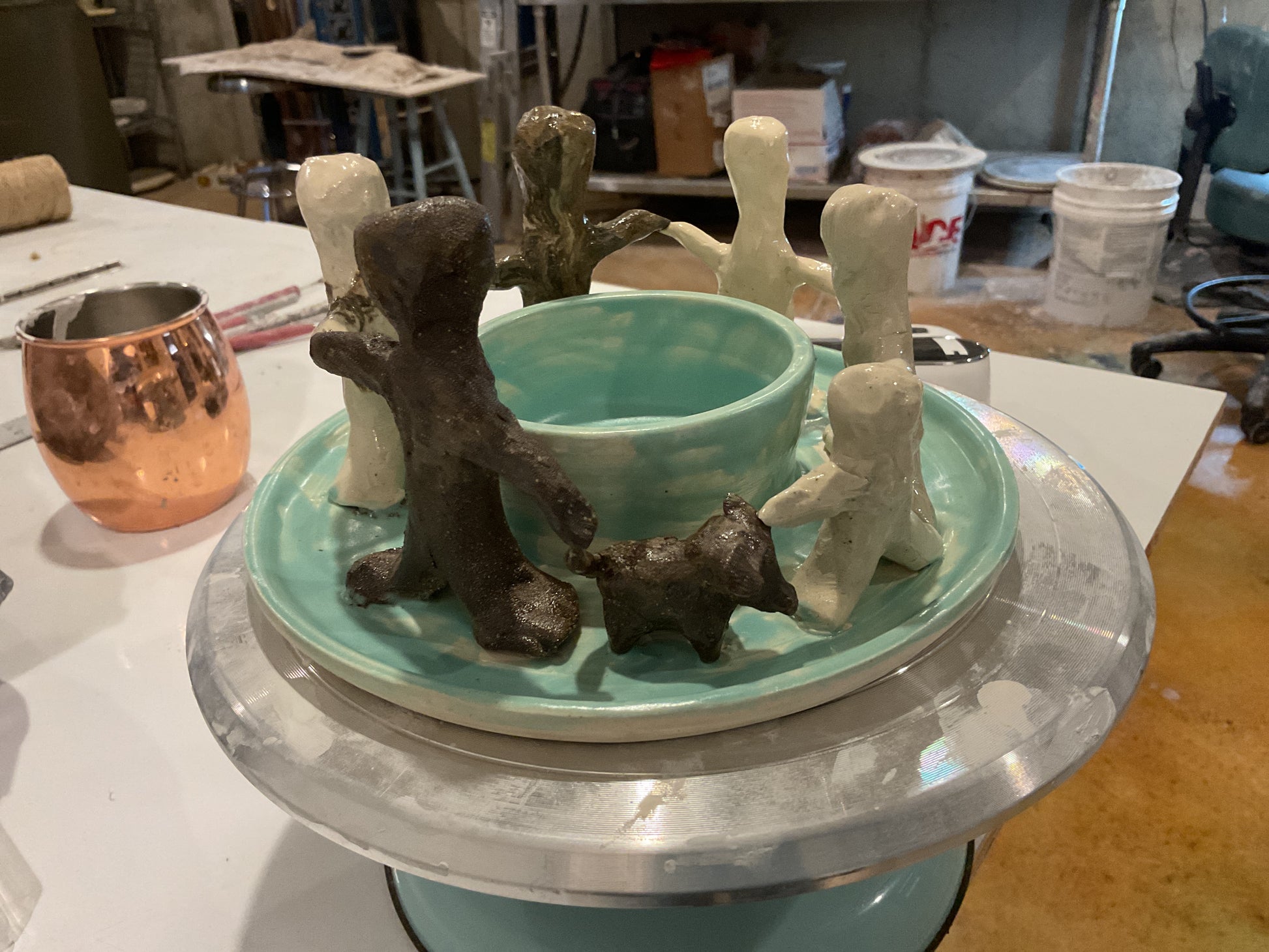 Pottery- circle of friends w dog.