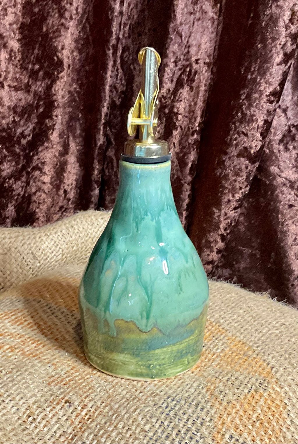 Pottery- green oil bottle