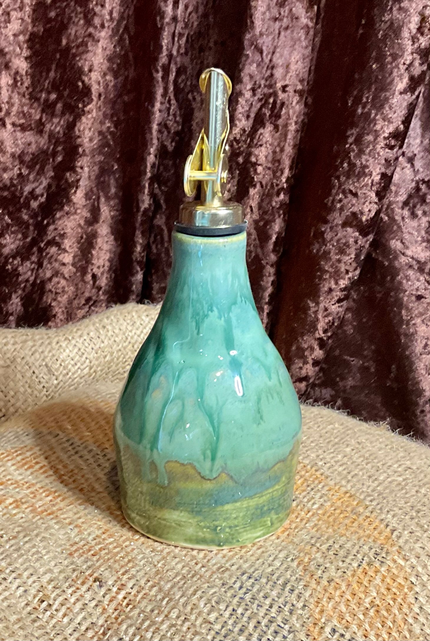 Pottery- green oil bottle
