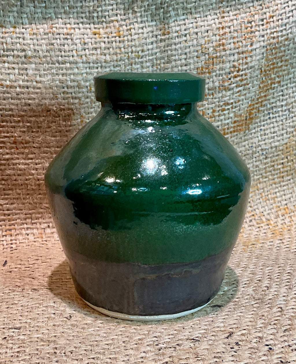Pottery-green lidded pot