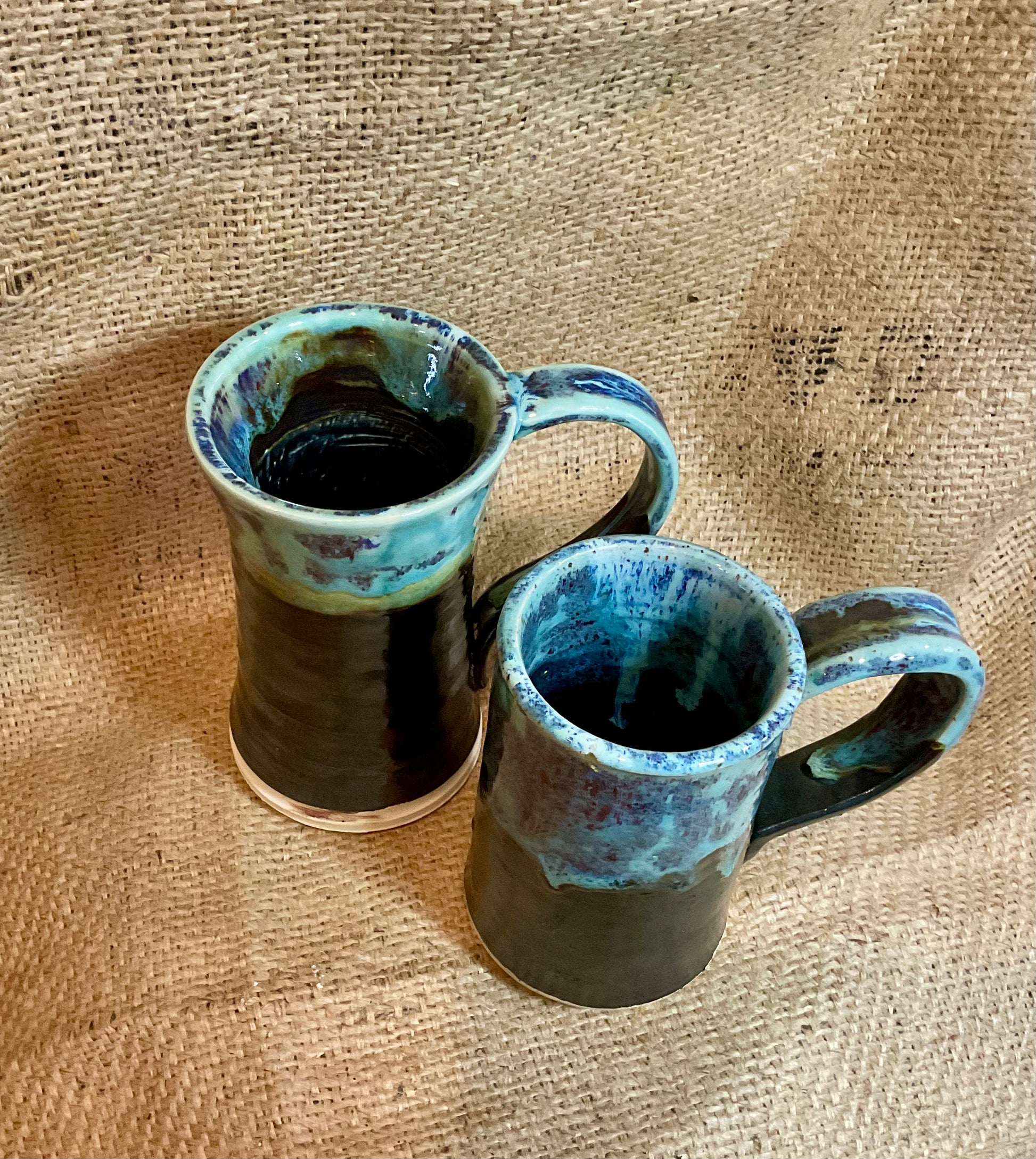 Pottery- Mug warrior sky glazed mugs.