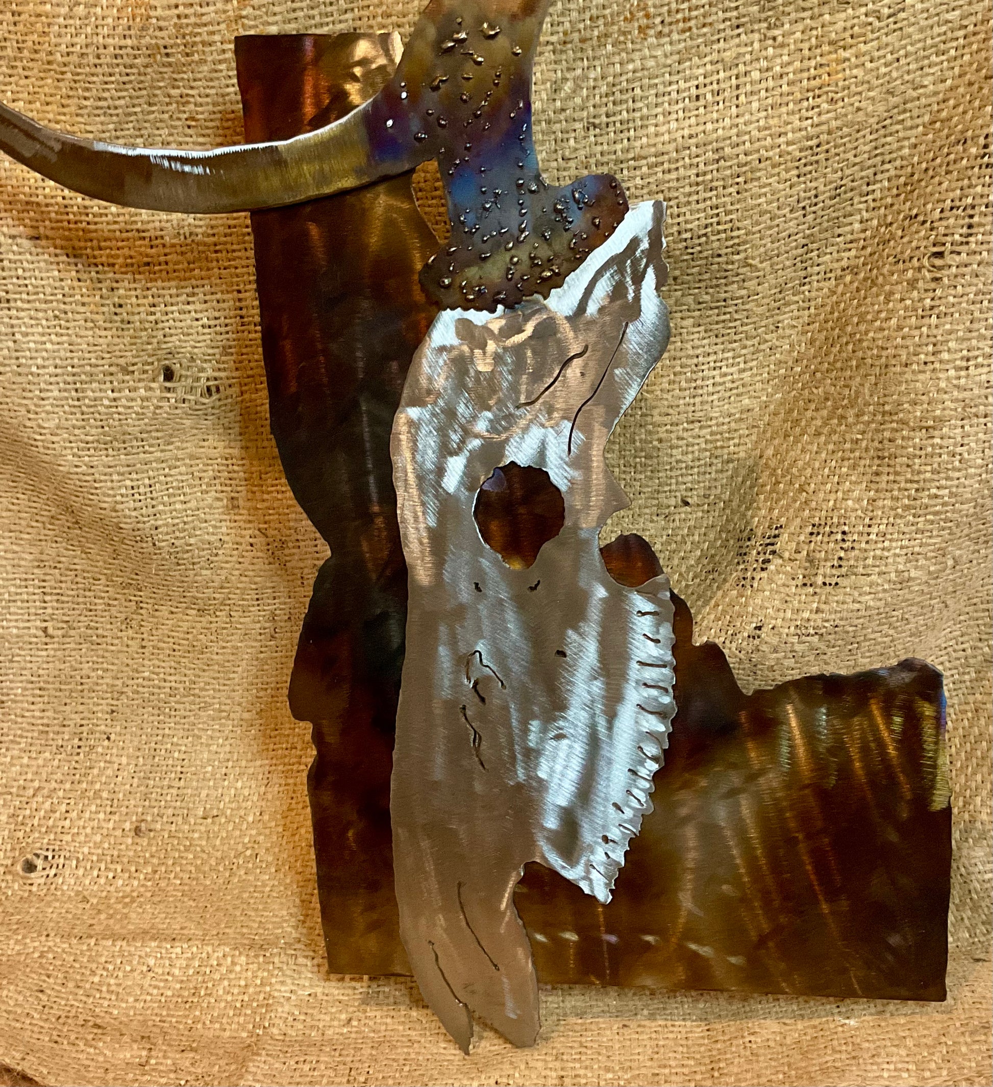 Metal elk skull over Idaho